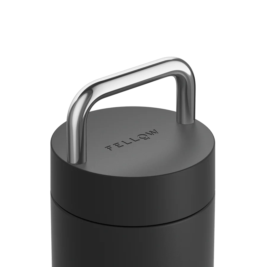 Elegant insulated tumbler with ceramic coating, thin sippable lip, and premium metal handle. Holds 20 ounces and is easy to carry.