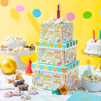 Make every birthday unforgettable. This three-tier birthday gift tower is packed with chocolates, cookies, nuts, and festive treats—beautifully wrapped and ready to wow.