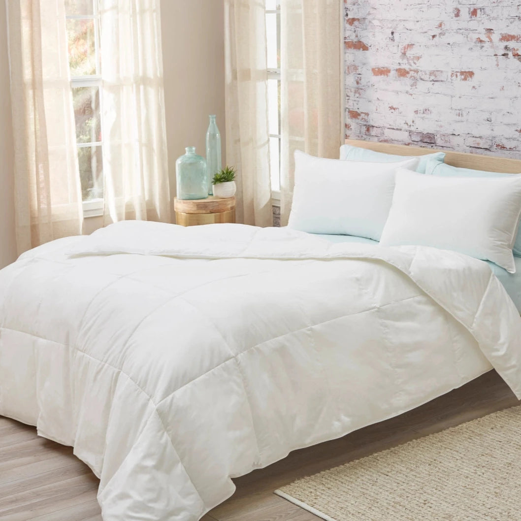 300 thread count cotton sateen comforter with premium down alternative polyester fill, breathable and durable for year-round use. Luxurious, soft, and hypoallergenic for a restful night's sleep.