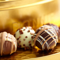 Holiday Gift Basket – Festive Wreath Tin with Assorted Chocolate Truffles