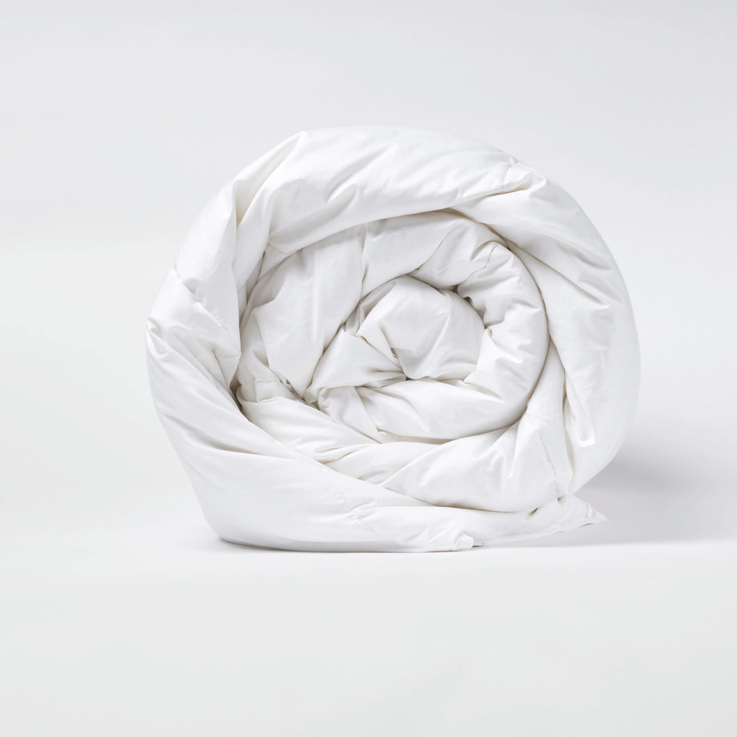 300 thread count cotton sateen comforter with premium down alternative polyester fill, breathable and durable for year-round use. Luxurious, soft, and hypoallergenic for a restful night's sleep.