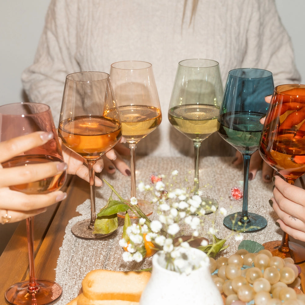 Colorful wine glasses, perfect for any wine type, adding a splash of color and elegance to any occasion."