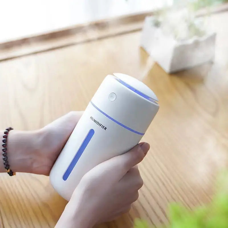 Humidifier that adds soothing hydration and calming ambiance with soft LED lighting—perfect for elevating self-care, freshening up any space, from bedrooms to desks.