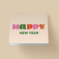 A beige greeting card featuring the word "HAPPY" in large, retro, multi-colored bubble letters across the top, with "NEW YEAR" printed underneath in a dark green sans-serif font.